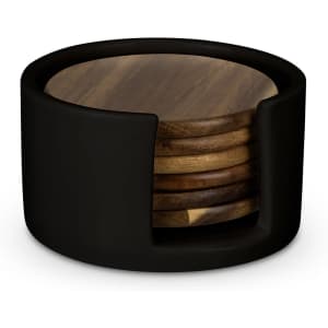 A set of wooden coasters in a black holder, featuring a smooth finish and circular design.