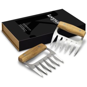 Two stainless steel meat shredding claws with wooden handles, presented in a black box.