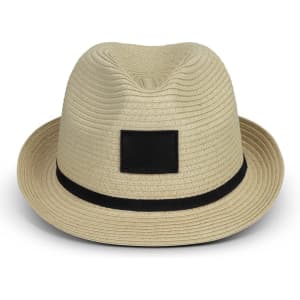 A beige fedora hat with a black band and a blank patch on the front.