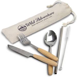 A stainless steel cutlery set with a knife, fork, spoon, straw, and cleaning brush, featuring wooden handles and a storage bag.
