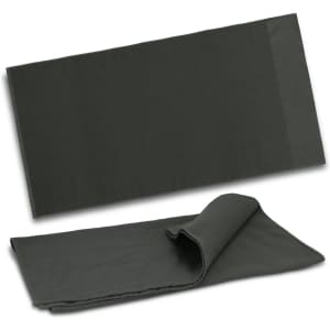 A dark green waffle towel, featuring a textured surface, folded and laid flat. Includes a logo detail.