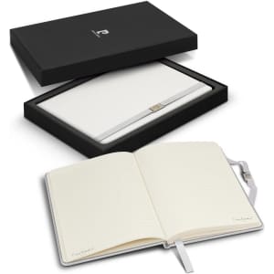A notebook gift set featuring a white notebook with lined pages, presented in a black box with a logo.