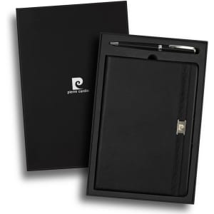 A black notebook and silver pen set housed in a black gift box, featuring a brand logo.