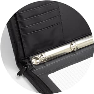 A black Carrington Portfolio with a zipper, featuring pockets and a metal ring binder inside.