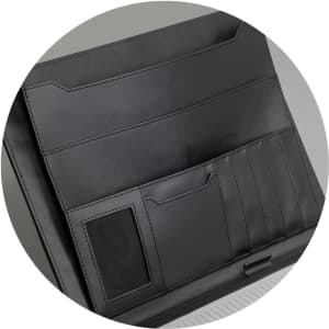 A black Melrose Portfolio with multiple pockets and a smooth finish, featuring a logo.