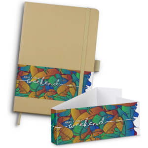 A kraft notebook with a colourful patterned band featuring floral designs and an elastic closure.