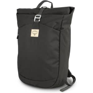 A dark green roll-top backpack featuring a front pocket and branding. It has adjustable shoulder straps and a top handle.
