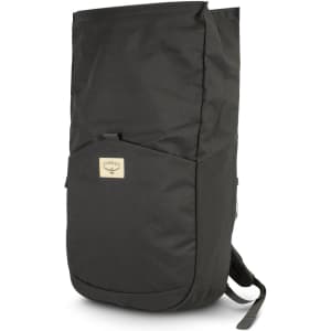 A dark green roll-top backpack with a logo on the front and adjustable straps.