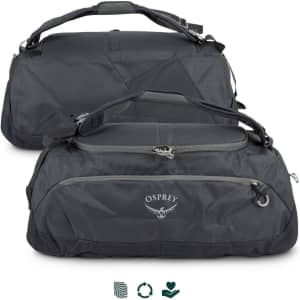A black Osprey Daylite duffle bag, featuring multiple compartments and an adjustable shoulder strap, with a logo visible.