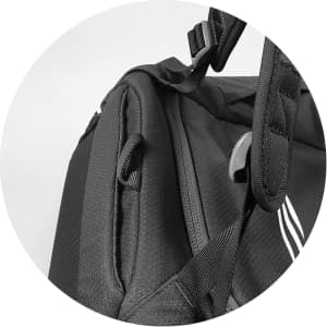 A black duffle bag featuring textured fabric and adjustable straps, with a logo present.