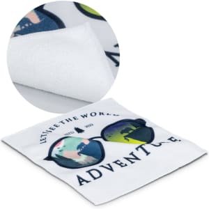 A microfiber cleaning cloth featuring a design of sunglasses and the phrase "Adventure" in white and colourful graphics.