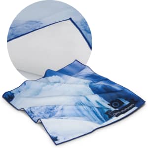 A large, blue and white printed cloth with a textured white border and a logo in one corner.