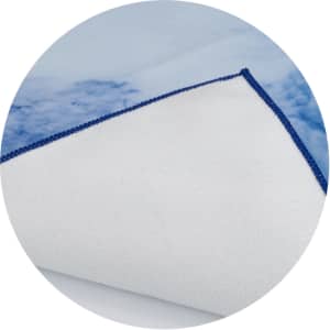 A large promotional product featuring a blue and white patterned cover with a contrasting edge. It has a logo.