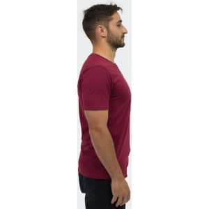 A unisex TRENDSWEAR Element T-shirt in maroon, viewed from the side, featuring a simple design and branding.