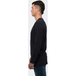 A long sleeve crew shirt in black, displayed on a male model from the side, featuring a logo.