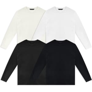 Four long sleeve crew shirts in black, white, and cream, arranged in pairs, featuring a subtle logo.