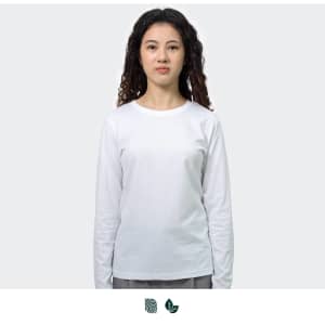 A long sleeve crew shirt in white, designed for women, featuring a logo.