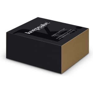 A sleek black and gold packaging box for the Keepsake Onsen Tea Set, featuring a logo on the front.