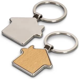 A silver and wooden house-shaped key ring with a keychain loop. The wooden side features a light timber finish.
