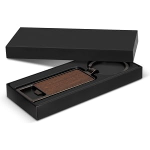 A drink bottle opener key ring with a wooden insert, presented in a sleek black box.