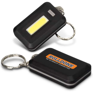 A black key ring light with a COB light and a metal keychain, featuring a logo on one side.