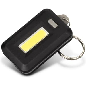 A compact black key ring light with a yellow COB light panel and a metal keychain attachment.