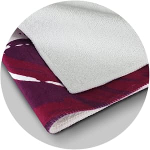 A bar towel featuring vibrant colours, with a textured side and a soft, absorbent surface. It has a branding logo.