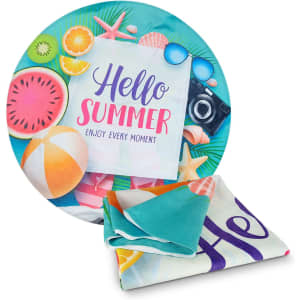 A full-colour beach towel featuring a vibrant summer design with watermelons, seashells, and sunglasses, plus a logo.