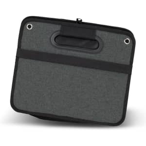 A grey fabric trunk organiser featuring a handle and black trim, with eyelets for attachment.
