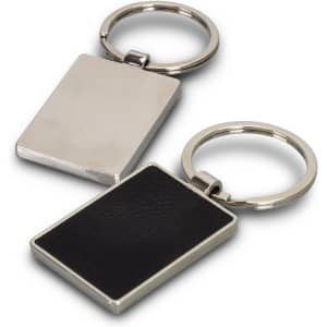 A rectangular key ring featuring a polished silver finish and a black textured surface on one side.