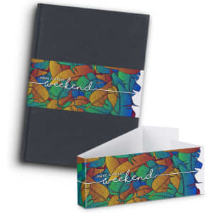 A hard cover notebook in black with a colourful leaf-patterned band featuring a logo.
