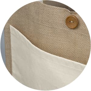 A natural jute tote bag featuring a cream-coloured pocket and wooden button detailing. It has a simple, eco-friendly design.