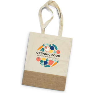 A cream tote bag featuring a vibrant organic food design and a natural woven base. It has long handles for easy carrying.