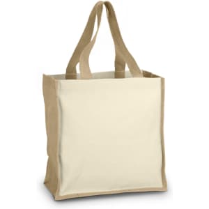 A tote bag with natural canvas sides and jute handles, featuring a plain design and a sturdy structure.