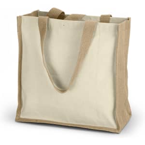 A beige tote bag made of canvas with sturdy handles and a natural jute base. It features a logo.