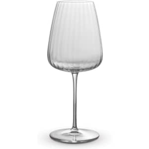 A clear glass wine glass with a ridged design and a slender stem. Features a smooth base and a stylish shape.