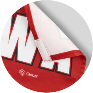 A red and white custom women's netball bib featuring a logo and a smooth fabric finish.