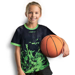 A girl wearing a black and green custom sports T-shirt holds a basketball, featuring an abstract design.