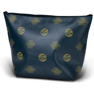 A medium cosmetic bag in dark blue with a gold pattern, featuring a zip closure and an interior compartment.