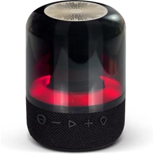 A black and transparent Bluetooth speaker with a rounded design and red illumination at the base. It features a logo.