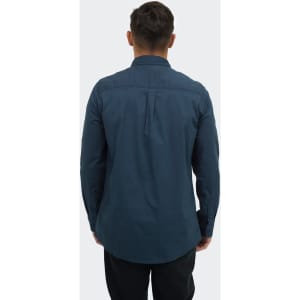 A men's poplin button-up shirt in navy blue, featuring a back pleat and long sleeves. Includes a logo.