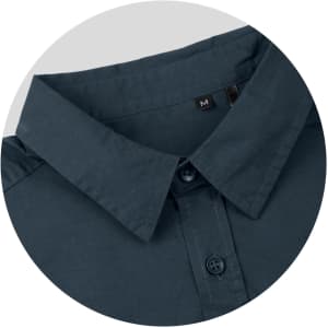 A dark teal button-up shirt featuring a classic collar and a small logo on the tag.