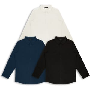Three button-up shirts in white, navy blue, and black, all featuring collars and long sleeves. Each shirt has a logo.
