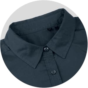 A button-up shirt in dark grey with a classic collar and buttons, featuring a logo.