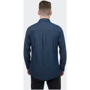 A denim shirt in a dark blue shade, featuring a button-up design and long sleeves, with a branded logo.