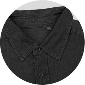 A black denim button-up shirt featuring a collar and front button placket. It has a label indicating medium size.
