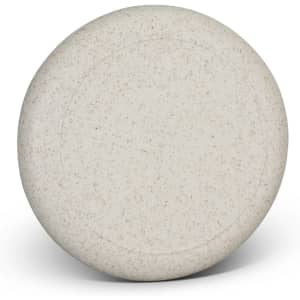A round, speckled light grey frisbee featuring a smooth surface and no visible branding or text.