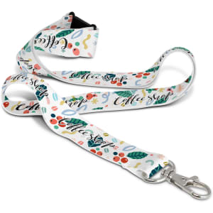 A colourful lanyard featuring various patterns and a clip for attachment, displaying a logo.