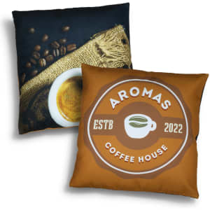 A decorative cushion featuring a coffee design on one side and a coffee cup with beans on the other, in brown and cream colours.