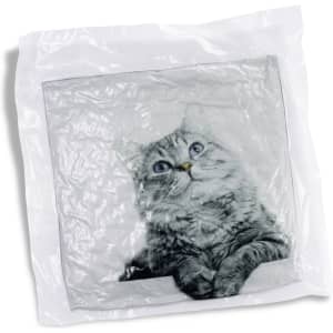 A plush cushion featuring a grey cat design, encased in plastic packaging. The cushion has a sleek square shape.